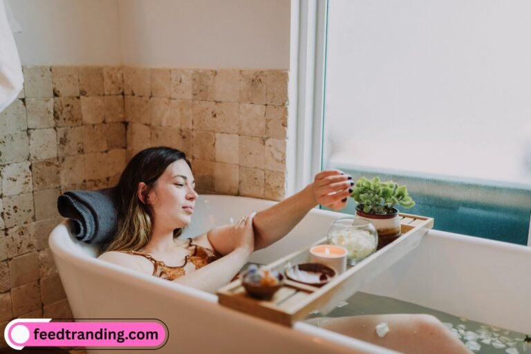 A woman in a relaxing mood in a bathtub, surrounded by bubbles/flower petals.